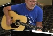 Tom Schommer playing guitar.jpg